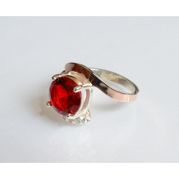 Серебряное кольцо с золотыми вставками (177к)