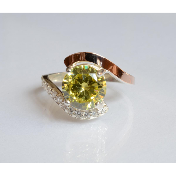 Серебряное кольцо с золотыми вставками (177к)