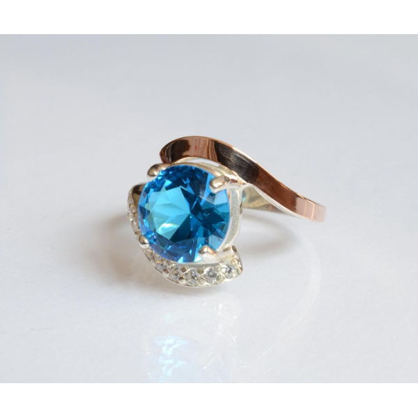 Серебряное кольцо с золотыми вставками (177к)