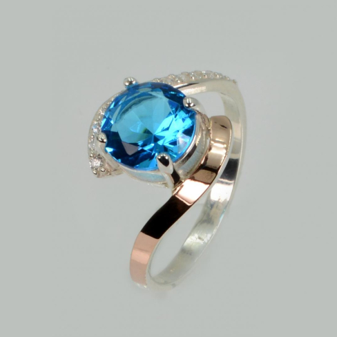 Серебряное кольцо с золотыми вставками