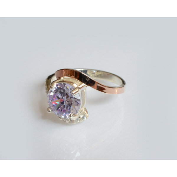 Серебряное кольцо с золотыми вставками (177к)