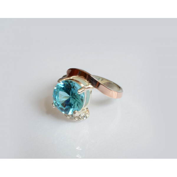 Серебряное кольцо с золотыми вставками (177к)