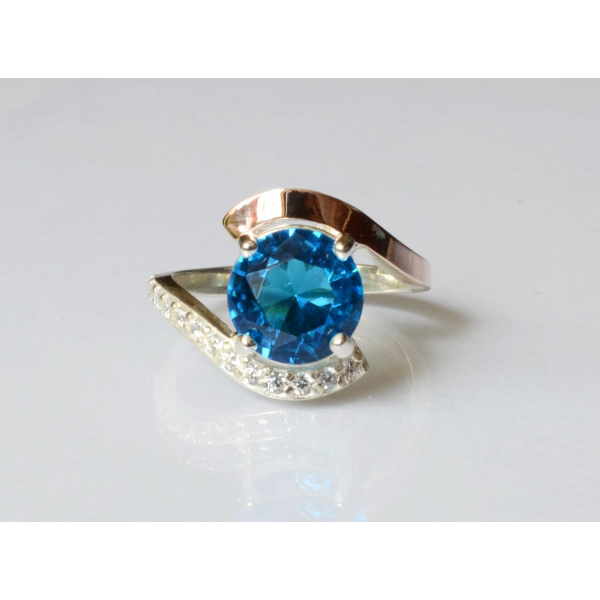 Серебряное кольцо с золотыми вставками (177к)