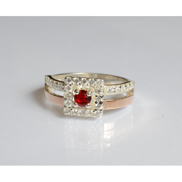 Серебряное кольцо с золотыми вставками (179к)