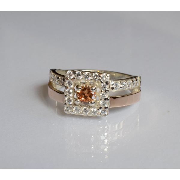 Серебряное кольцо с золотыми вставками (179к)