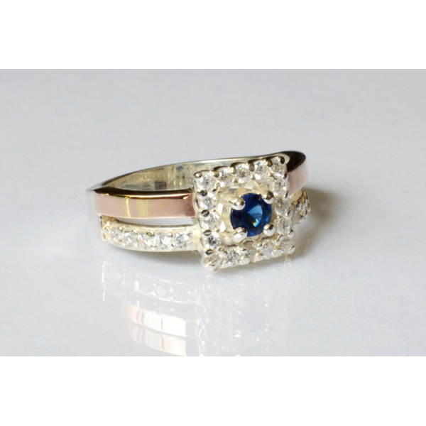 Серебряное кольцо с золотыми вставками (179к)