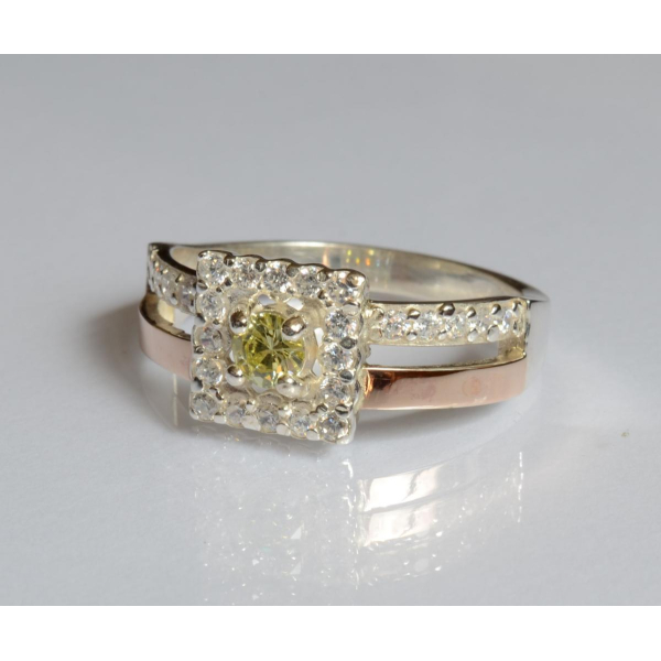 Серебряное кольцо с золотыми вставками (179к)