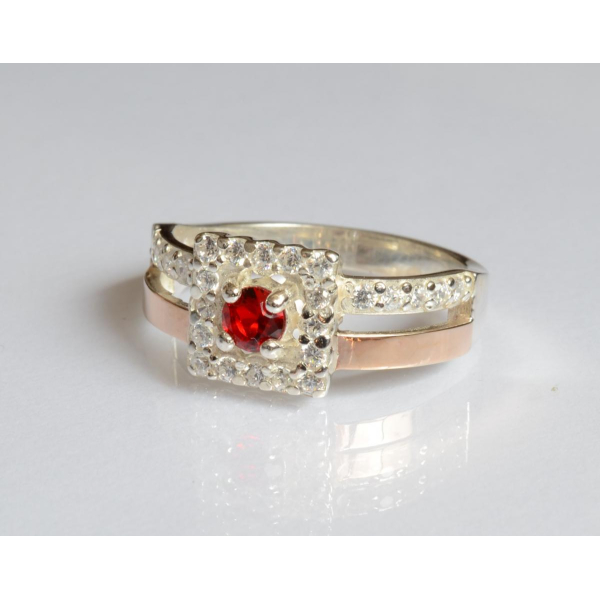 Серебряное кольцо с золотыми вставками (179к)