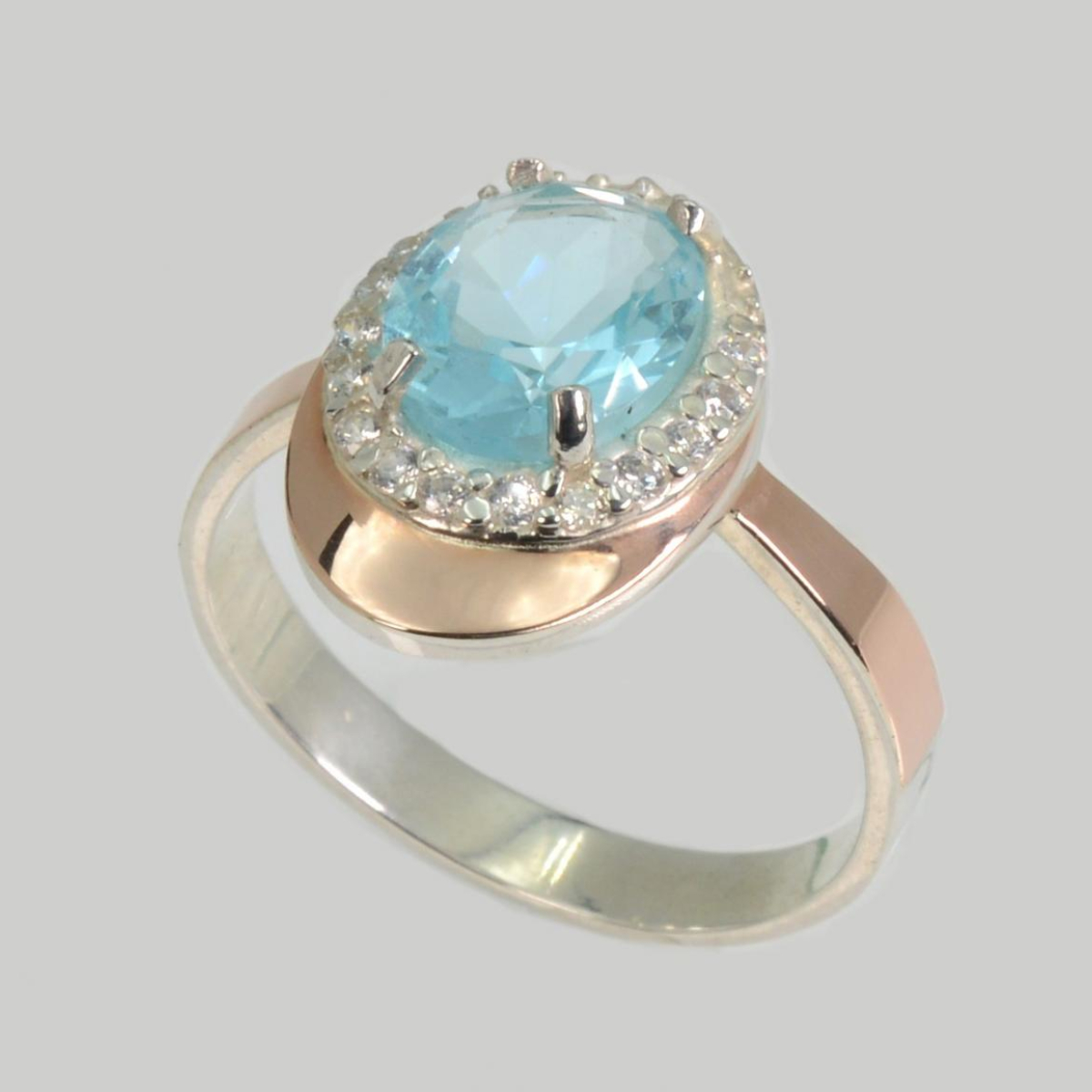 Серебряное кольцо с золотыми вставками (180к)