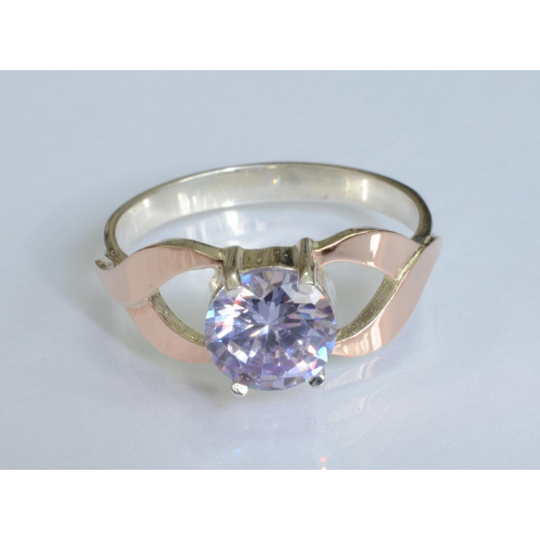 Серебряное кольцо с золотыми вставками (181к)