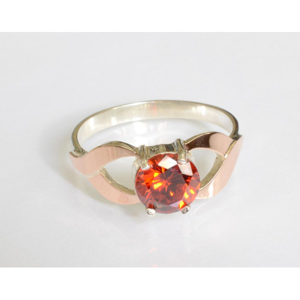 Серебряное кольцо с золотыми вставками (181к)