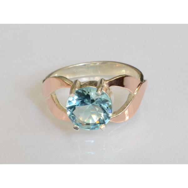 Серебряное кольцо с золотыми вставками (181к)