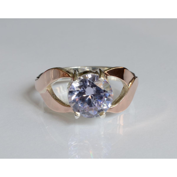 Серебряное кольцо с золотыми вставками (181к)