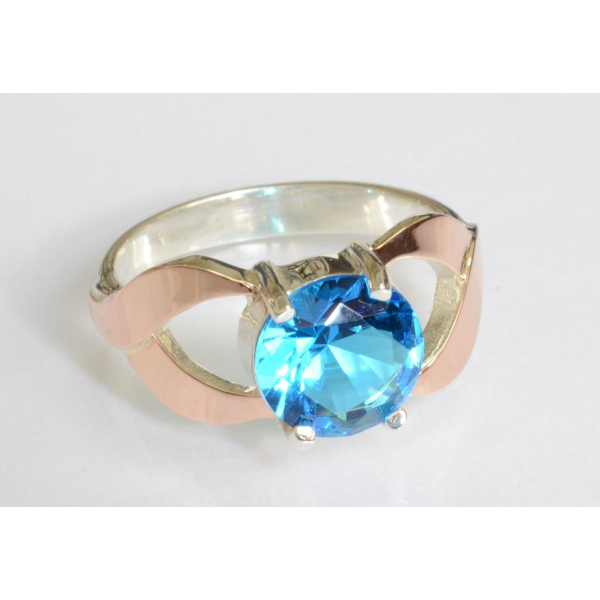 Серебряное кольцо с золотыми вставками (181к)