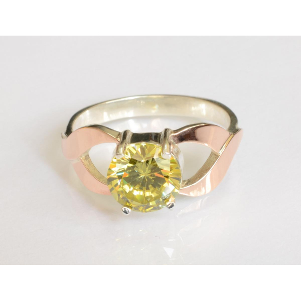 Серебряное кольцо с золотыми вставками (181к)