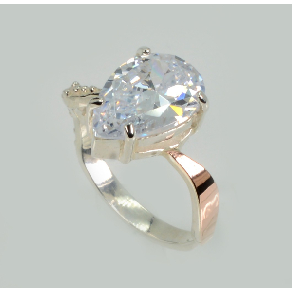 Серебряное кольцо с золотыми вставками (183к)