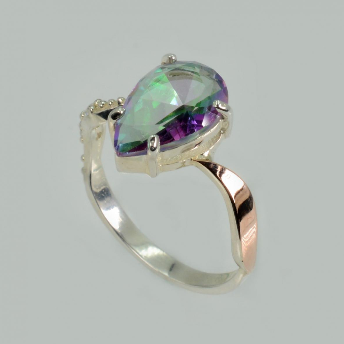 Серебряное кольцо с золотыми вставками (183к)