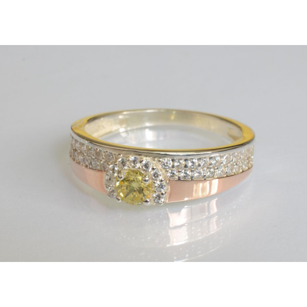 Серебряное кольцо с золотыми вставками (184к)