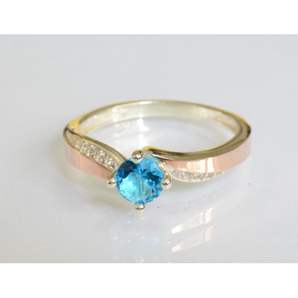 Серебряное кольцо с золотыми вставками (187к)