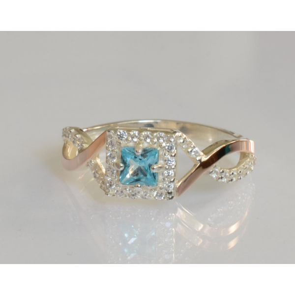 Серебряное кольцо с золотыми вставками (190к)