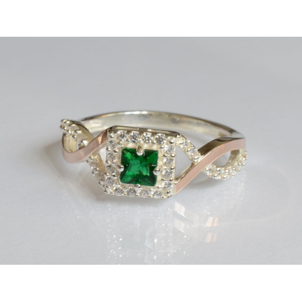 Серебряное кольцо с золотыми вставками (190к)