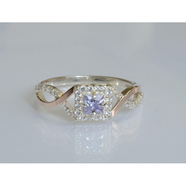 Серебряное кольцо с золотыми вставками (190к)