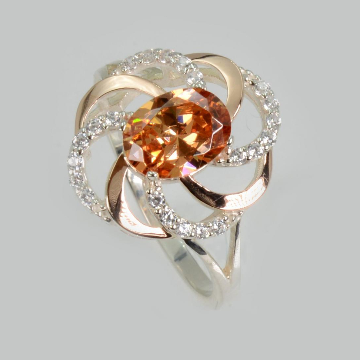 Серебряное кольцо с золотыми вставками (194к)