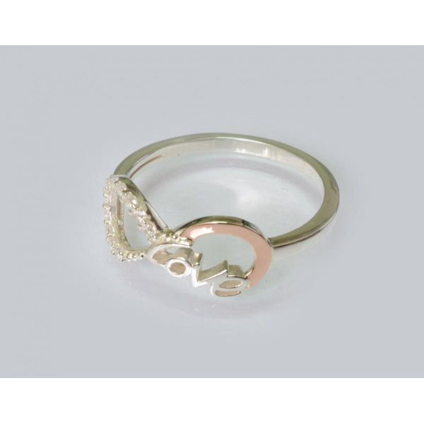 Серебряное кольцо с золотыми вставками (200к)