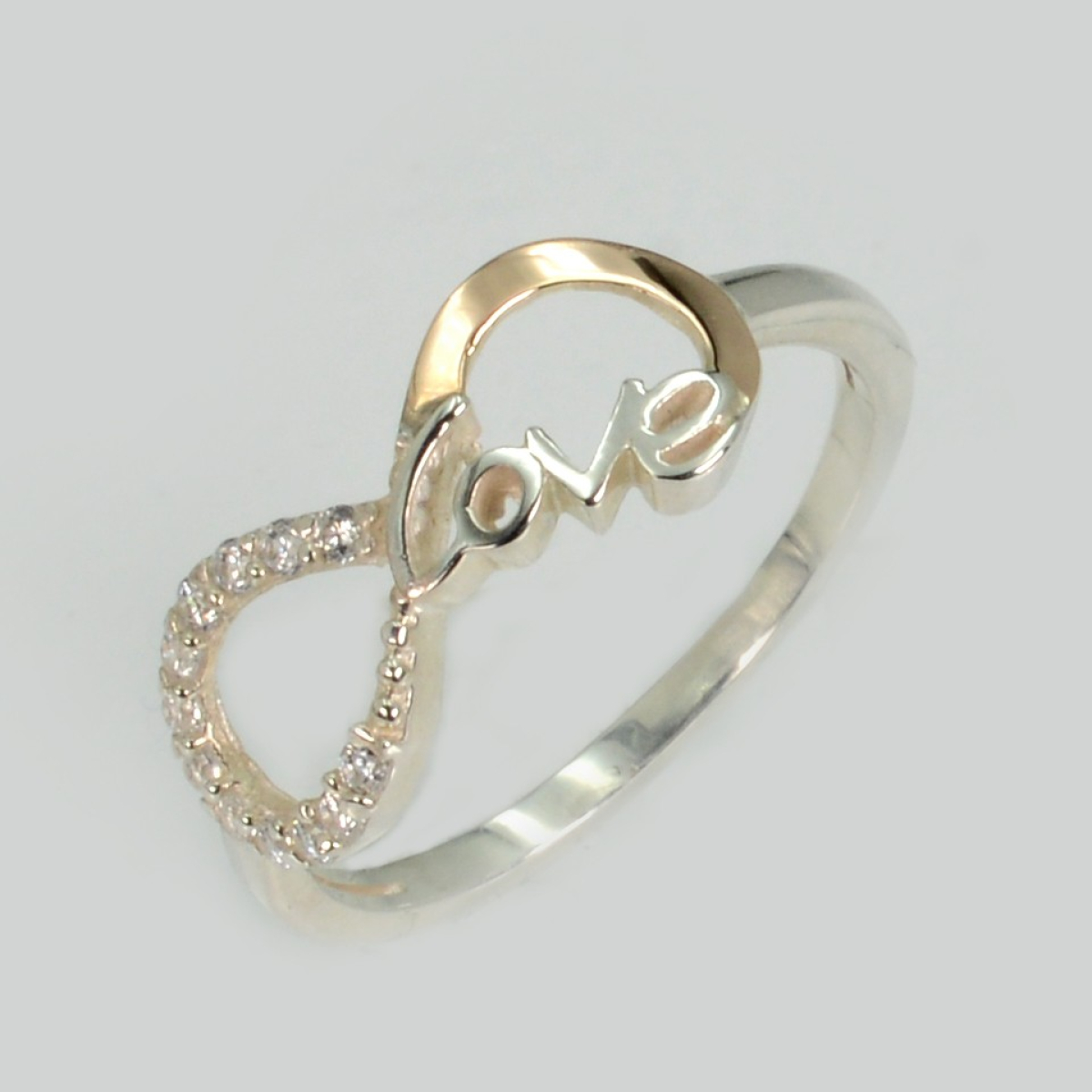 Серебряное кольцо с золотыми вставками (200к)