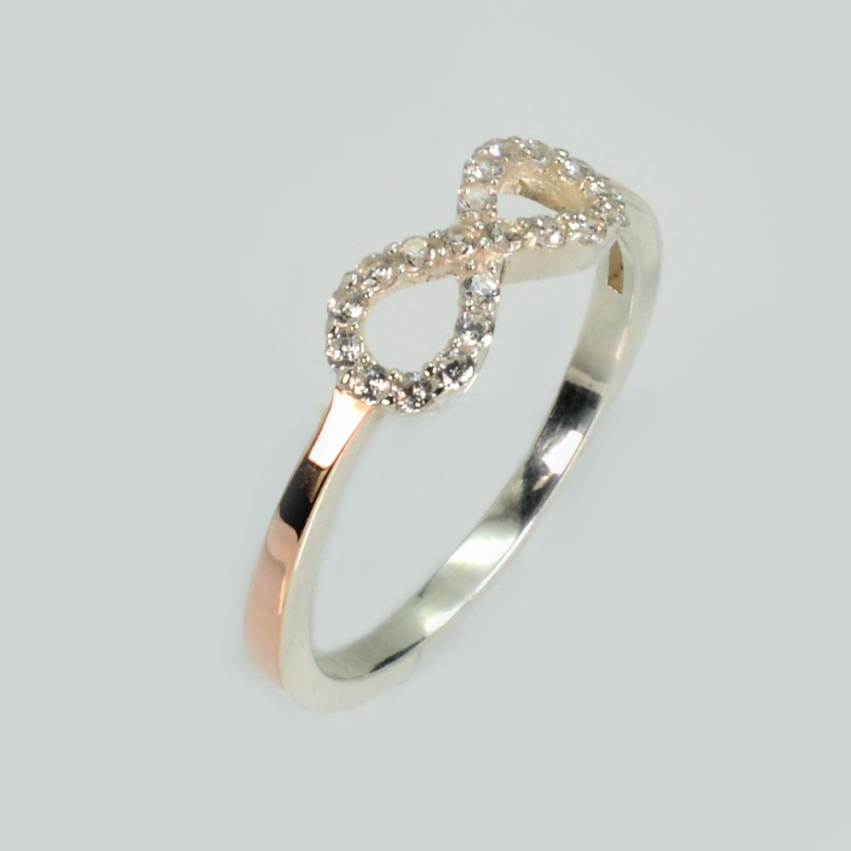 Серебряное кольцо с золотыми вставками (204к)