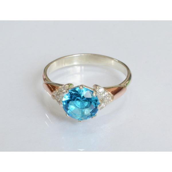 Серебряное кольцо с золотыми вставками (207к)