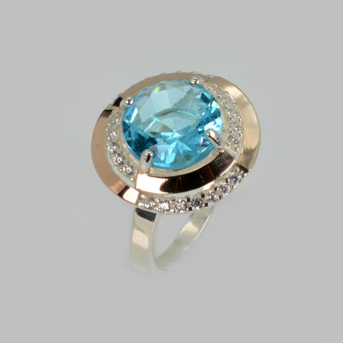 Серебряное кольцо с золотыми вставками (211к)