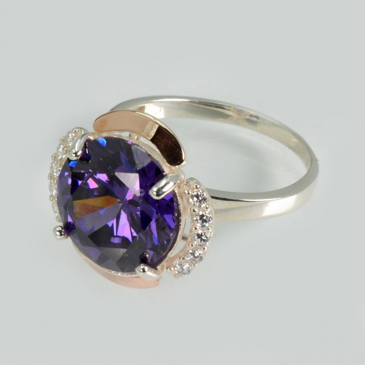 Серебряное кольцо с золотыми вставками (212к)