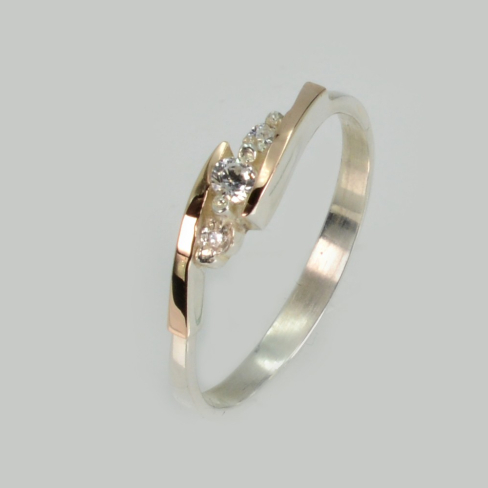 Серебряное кольцо с золотыми вставками