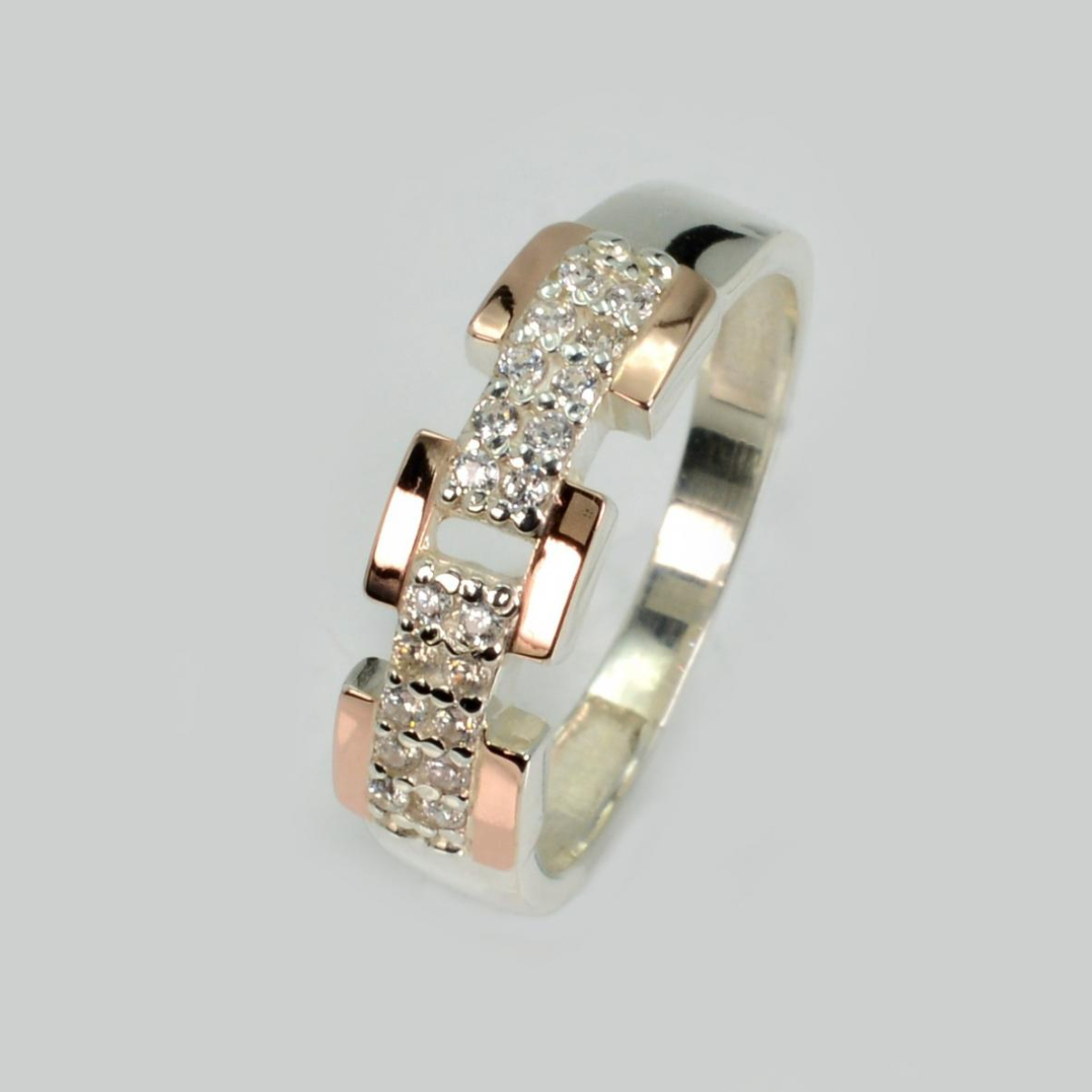 Серебряное кольцо с золотыми вставками (226к)