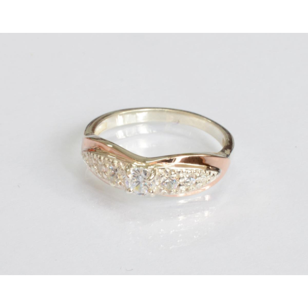 Серебряное кольцо с золотыми вставками (230к)