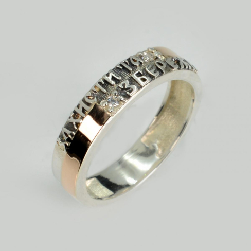 Серебряное кольцо с золотыми вставками 