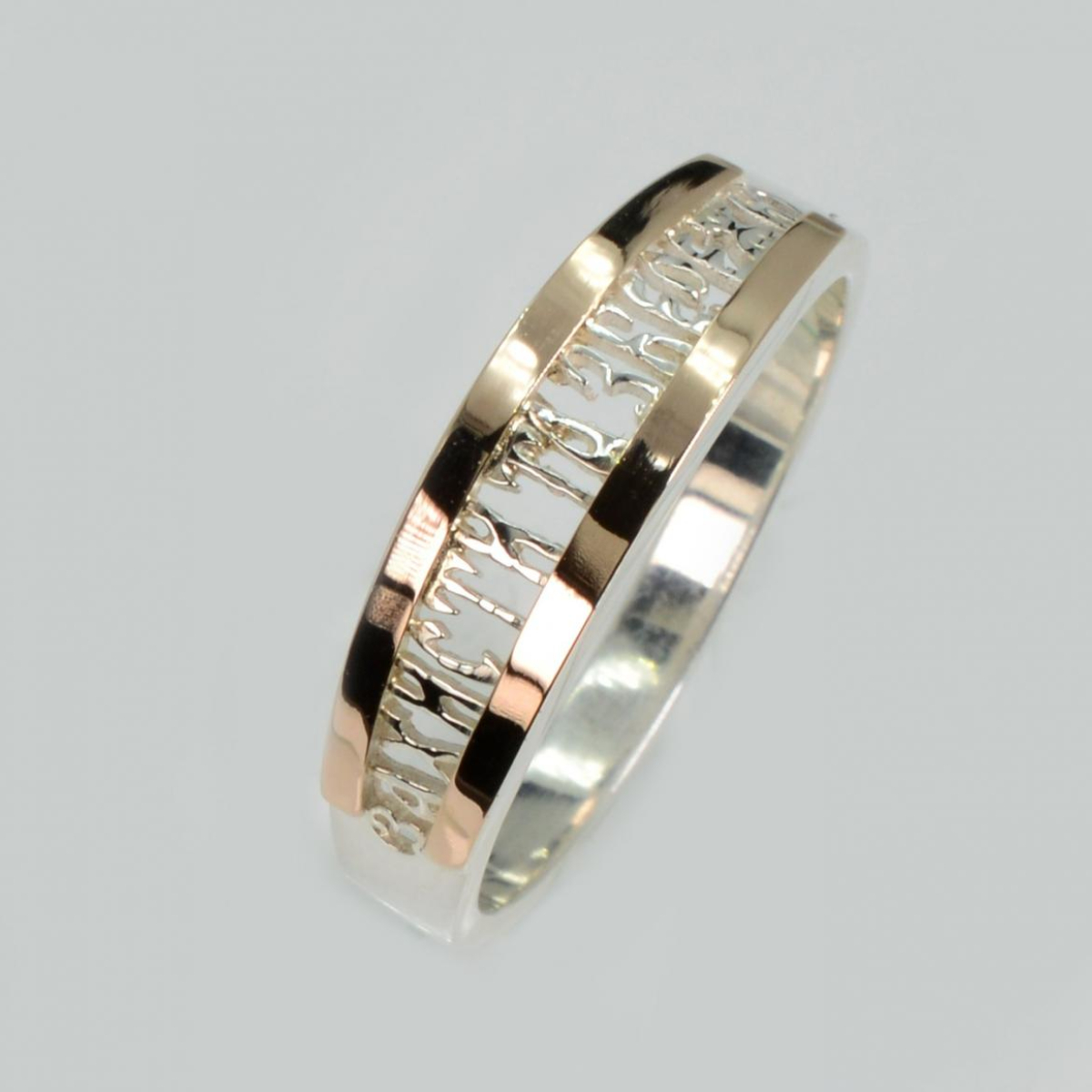 Серебряное кольцо с золотыми пластинми (253к)