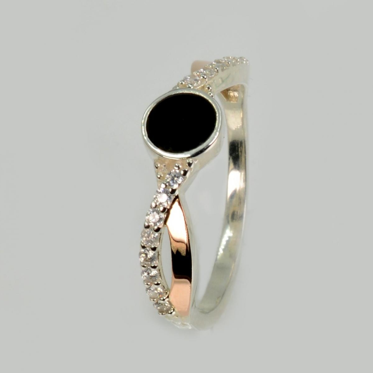 Серебряное кольцо с золотыми вставками (270к)