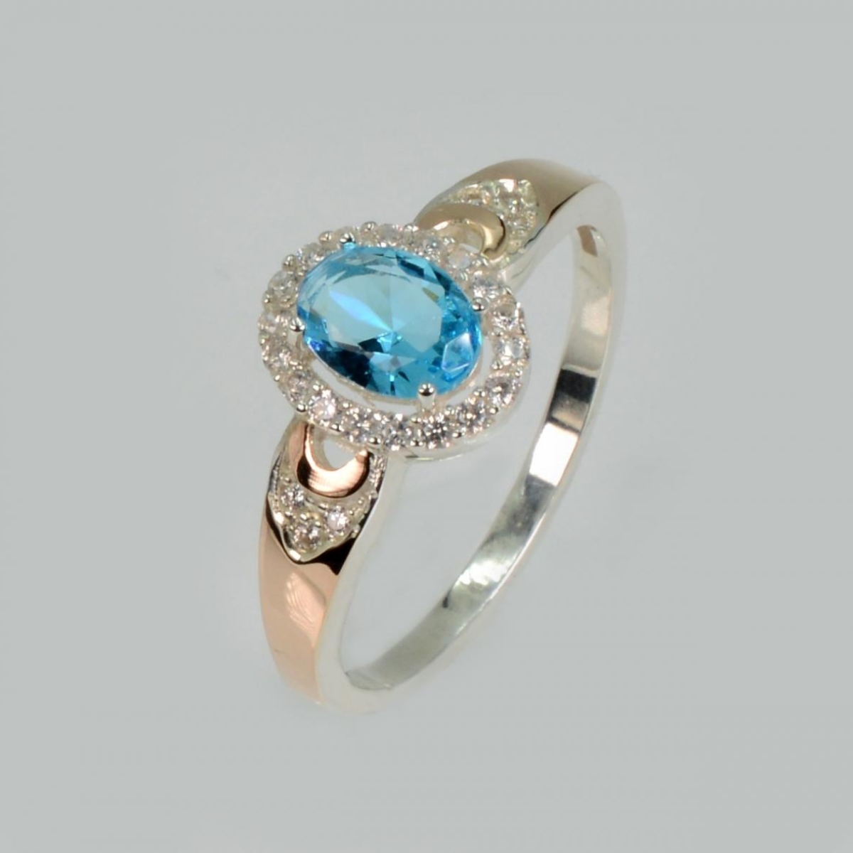 Серебряное кольцо с золотыми вставками (280к)