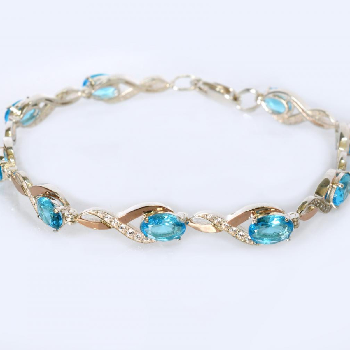 Серебряный браслет с золотыми пластинами и фианитами (бр30)