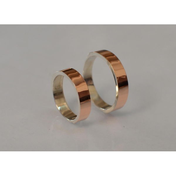 Серебряное обручальное кольцо с золотыми напайками, цена за одно кольцо (ОБР2)