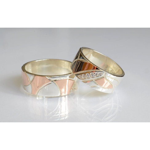 Пара обручальных колец из серебра с золотом