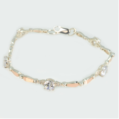 Серебряный браслет с золотыми пластинами