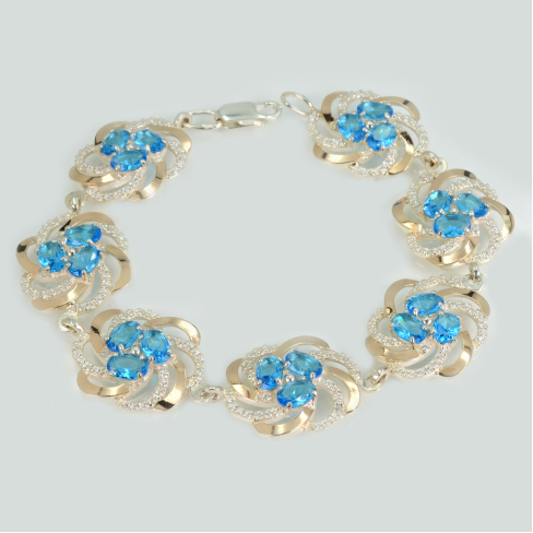 Серебряный браслет с золотыми вставками