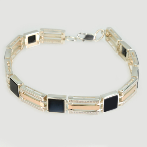 Серебряный браслет с золотыми пластинами и вставками из оникса