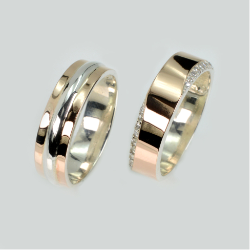 Пара обручальных колец из серебра с золотом