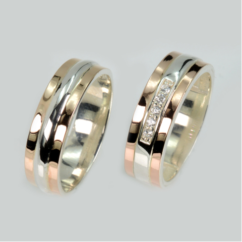 Пара обручальных колец из серебра с золотом