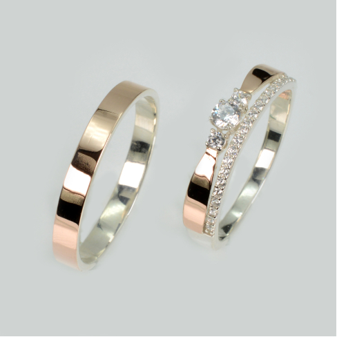 Пара серебряных обручальных колец с золотыми пластинами