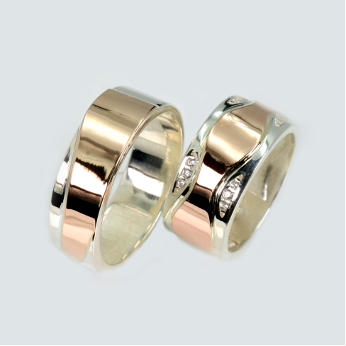 Пара обручальных колец из серебра с золотом